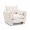 Fauteuil en bois et tissu bouclette avec coussins